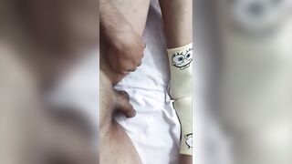Femboy plays with his dick in a spongbob socks