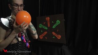 Nicky as a superhero destroys balloons