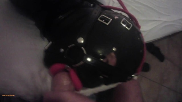 Milf hogtied in latex and high heels with a lip open mouth gag POV. Great mouth fucking action