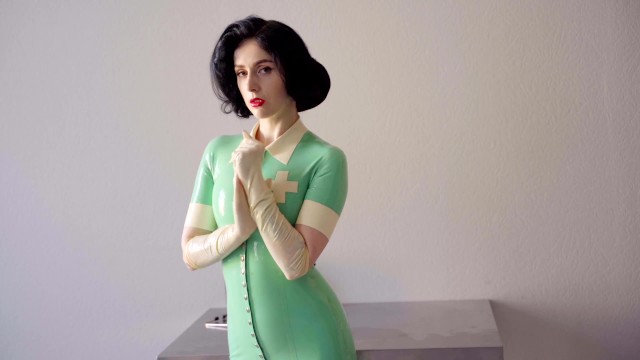 The nurse of your dreams in latex and surgical gloves