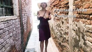 Flashing boobs, collecting views of people at a public cafe in front of the road.