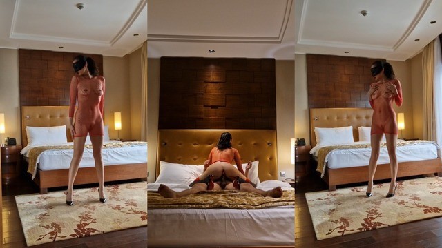Expensive escort girl serves a client in a hotel room