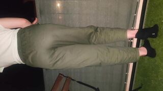 Pissing Her Green Pants on the Balcony with Neighbors Around