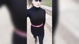 Silicone doll walking through the park