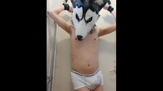 Bound pup holding his pee