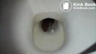 girl has shit in the toilet