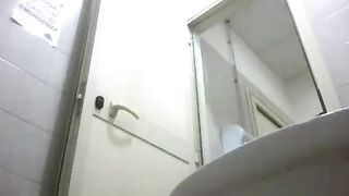 Amateur girl in a purple dress pissing