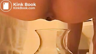 shitting into water bowl