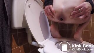 Constipated struggle over toilet