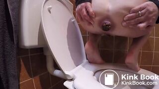 Constipated struggle over toilet