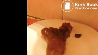 She dropped a big pile of shit on a white plate