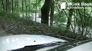 Girl liquid shitting on a white car hood