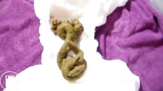 sexy skinny girl takes huge shit on diaper