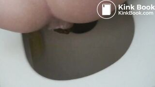 She farts, grunts and struggles to get a hard poop out