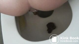 She farts, grunts and struggles to get a hard poop out