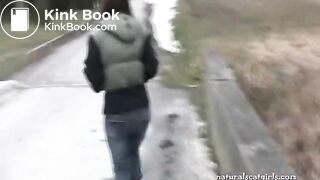 Girl shit and pissing on a bench by the stone wall - Pooping