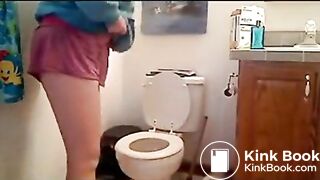 girl in glasses pooping