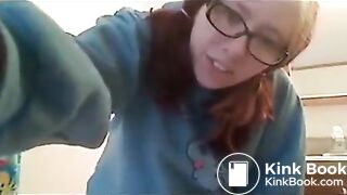girl in glasses pooping
