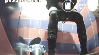 beautiful girl suffering from diarrhea in a public toilet