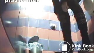 beautiful girl suffering from diarrhea in a public toilet