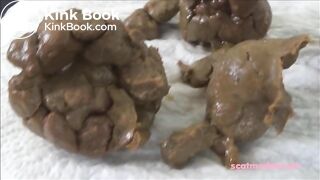 Huge compacted turds stretch her anus wide