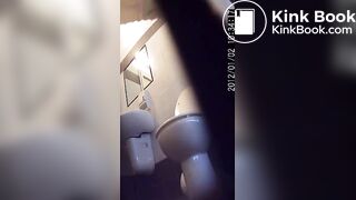 woman has diarrhea in a public toilet