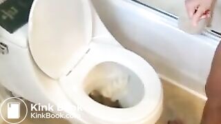 Girl on toilet pooping