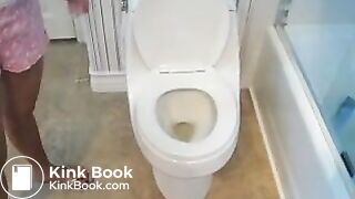 Girl on toilet pooping