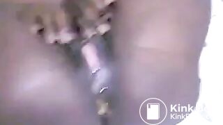 Black woman pooping on a white plastic hair