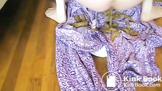 Pervy girl shits on some clothes