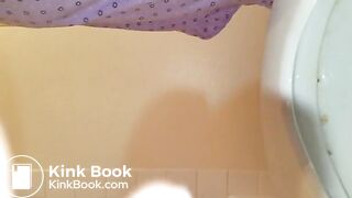 Michells poops in toilet close up