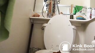 cute girl poops in a plastic food container