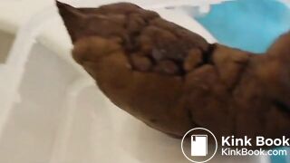 cute girl poops in a plastic food container