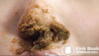 Eating and playing with her "meal"