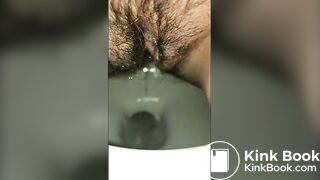 Hairy whore has a runny shit