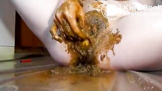 Scatgirl playing with veggie and fisting her pussy