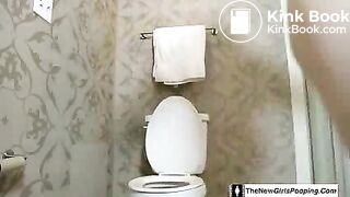 Brown haired teen pooping in reverse position