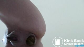 Poo standing from below