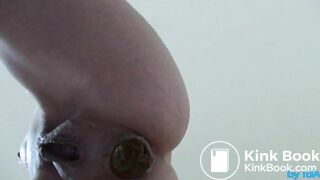 Poo standing from below