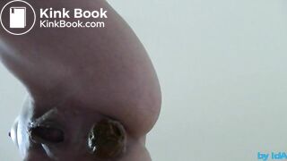 Poo standing from below