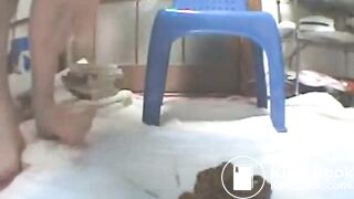 Asian Girl examins her shit