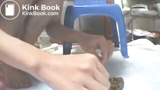 Asian Girl examins her shit