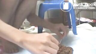 Asian Girl examins her shit