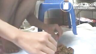 Asian Girl examins her shit