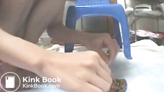 Asian Girl examins her shit