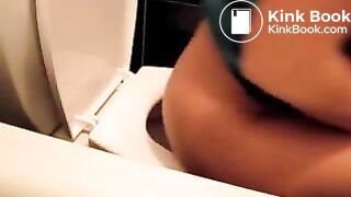 Girl pooping on toilet