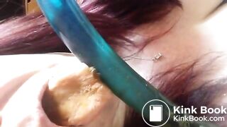 licking her dildo clean