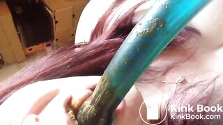 licking her dildo clean