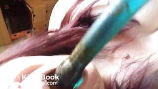 licking her dildo clean