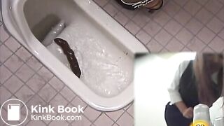 nice girl pushes a long piece of shit out of her ass